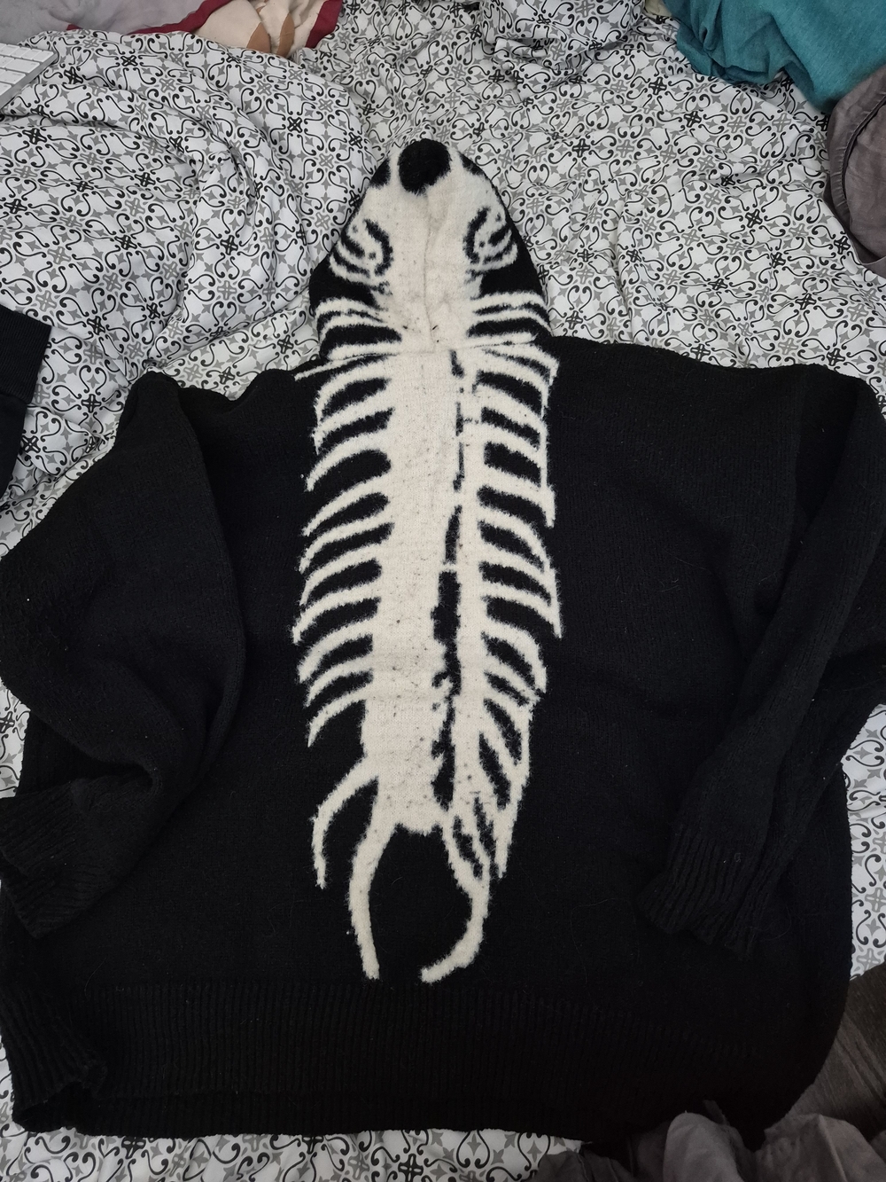 Black Sweater Hoodie with White Skeleton Spine Graphic